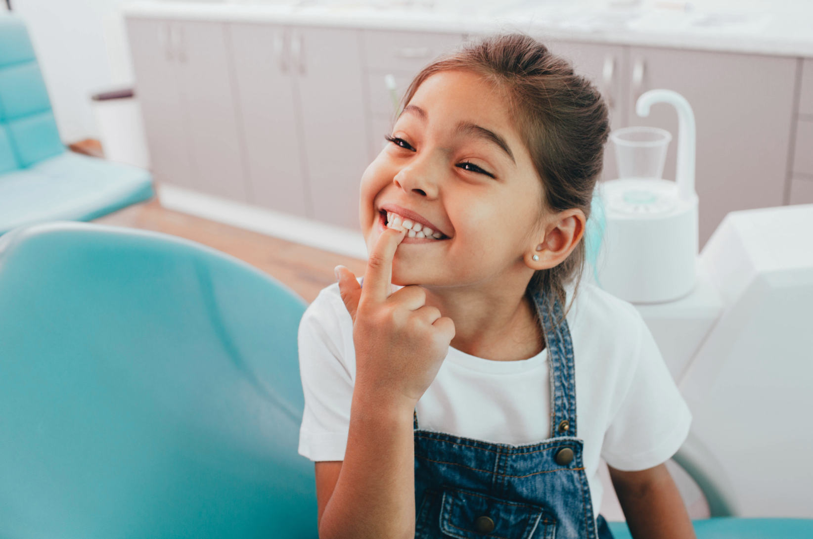 Macchie bianche sui denti dei bambini. Quali le cause